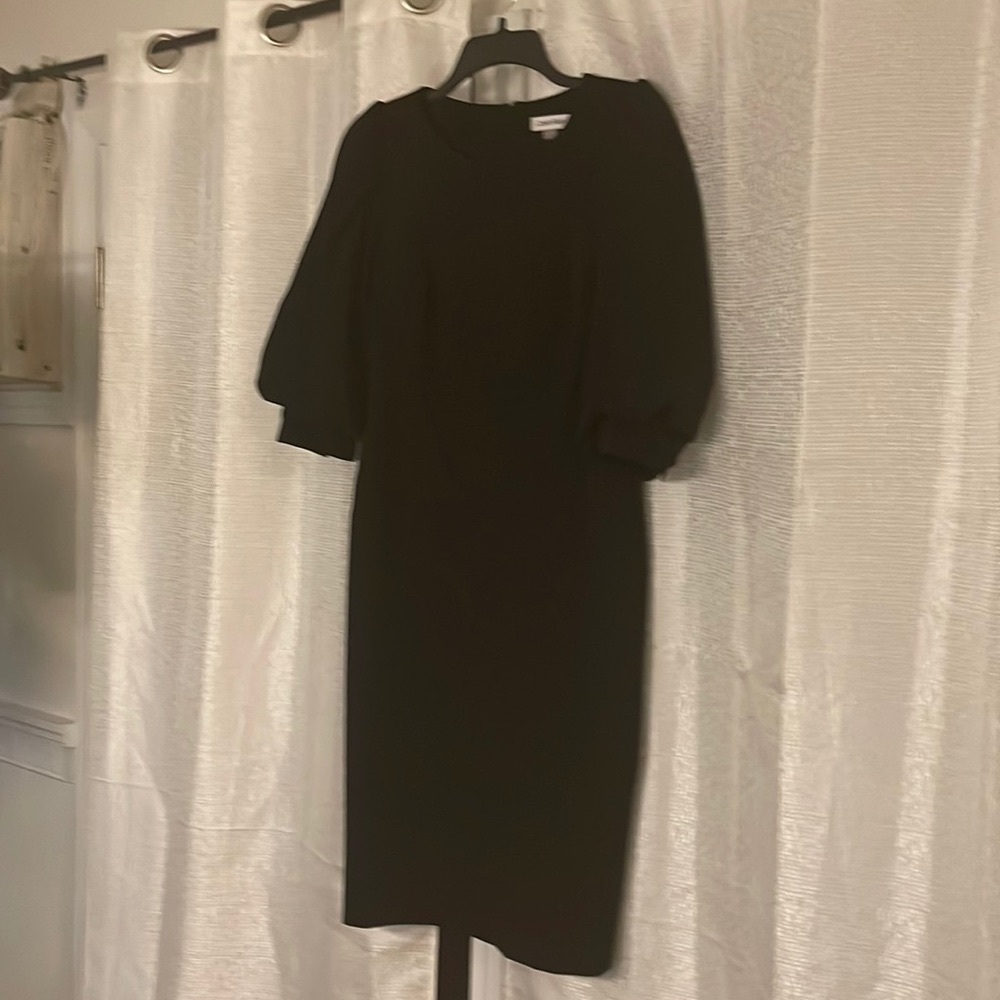 Calvin Klein/Black Dress/knee length soft w/stretch/puffy sleeves/zipper bk.